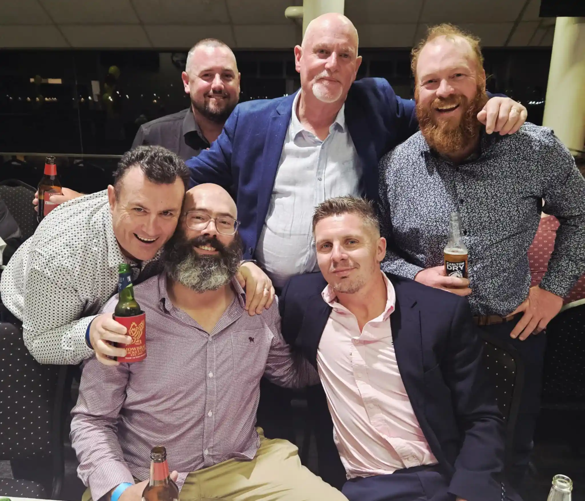 Group of men enjoying drinks together